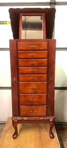 Jewelry Cabinet Full of Jewelry