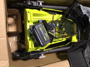 lot 35 image: Ryobi 40V Brushless 20in Cordless Self-propelled walk behind lawn mower and leaf blower with 6,0Ah Battery and charger (review pictures) )
