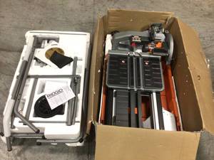 lot 112 image: RIDGID 10 in. Wet Tile Saw with Stand Good Condition See Pictures