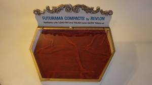 lot 35 image: Display Case Futurama Compacts By Revlon