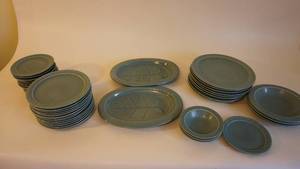 lot 48 image: Vintage Red Wing Village Green Various Dinner PlatesSaucers and Two Well and Tree platters.