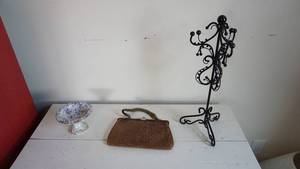 lot 94 image: Small Brown Leather Purse-White With Lilac Flowers On Pedestal Candy Dish-Black Rod Iron Jewelry Display Holder