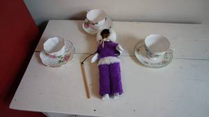 lot 104 image: Eskimo Doll-Three Hand Painted Old English Bone China Cups & Saucers