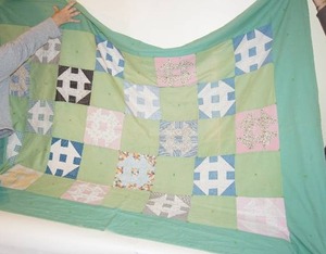 lot 124 image: Vintage Hand-Tied Block Quilt -52 x 83
