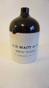 lot 128 image: Advertising One Gallon Stoneware Finger Jug R.H. Macy & Co. New York -Macys Department Sore