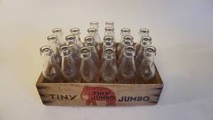lot 132 image: RARE FIND...1930s Embossed Elephant Antique Soda Pop Bottles in a Tiny Jumbo Wooden Crate -ALMOST FULL 20 of 24 MINT Bottles