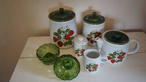 lot 149 image: McCoy USA Strawberry Canisters-Teapot-Cream & Sugar-Two Green Coin Pattern Glass Candle Holders