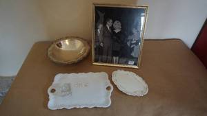 lot 155 image: Framed Photo with Marilyn & Montgomery Cliff  -Silver BowlDish -White Milk Glass Serving Trays -Crystal perfume