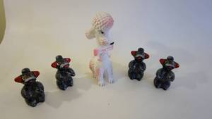lot 222 image: Two Sets Of 1950s Redware Poodles--7 12 White & Pink Poodle