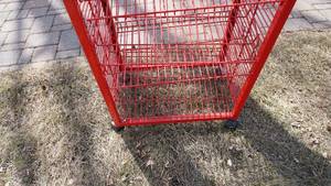 lot 306 image: Red Metal Rolling Display Stand