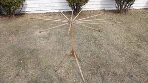 lot 314 image: Antique Folding Umbrella Style Wood Clothes Drying Rack
