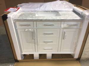 lot 39 image: Sonoma 48 in. W x 22 in. D x 34 in H Bath Vanity in White with White Carrara Marble Top by Home Decorators Collection Customer Returns See Pictures