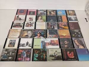 64 Assorted Cds