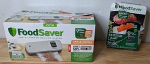 lot 41 image: FoodSaver Space-Saving Food Vacuum Sealer w Extra Vacuum Seal 1 Qt Bags - N