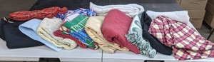 lot 136 image: A Bundle of Blankets - X