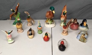 lot 157 image: A Fowl Collection of Bird Figurines - X