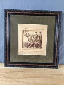 lot 180 image: Antique Framed Photograph of the Dodge City Peace Commission W. H. Harris, Luke Short, Bat Masterson, Charlie Bassett, Wyatt Earp, Frank McLain, and Neal Brown - X