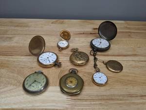 lot 11 image: Vintage Collection of 7 Pocket Watches and a Locket Elgin and Others  - X