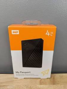 lot 24 image: Brand New WD 4TB My Passport Portable External Hard Drive - T