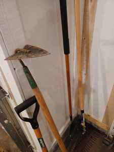 Four Lawn and Garden Tools - Two Metal Leaf Rakes, A Square Short Handled Shovel and Garden Hoe