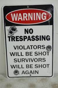 lot 24 image: NEW Novelty Trespassing Tin Sign - Survivors Shot Again