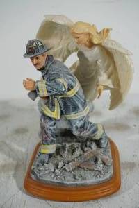 lot 14 image: Red Hats of Courage The Search Limited Edition Firefighter Figure