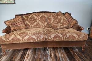 Antique Looking Couch--Wooden Decorative Feet & Arm Ends--Upholstered Brown & Tan  With Three Decorative Pillows To Match