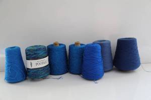 Seven Skeins Of Blue Yarn--(One Is Yeoman Poodle)