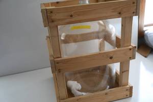 Seven Gallon Jug--(Kept Inside A Wooden Framed Item For Safety)
