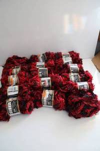 Fourteen Skeins Of Bernat Yarn---Red & Black