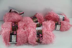 Eight Skeins Of Pink Yarn