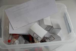 Tub Filled With Parts For Hummingbird Feeders-Instructions On Dripping Or Leaking Hummingbird Feeders-Flange Bearings
