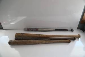 Four Antique Baseball Or Softball Bats--Three Are Wooden -Flamed Tempered Louisville Slugger One & One Aluminum Bat