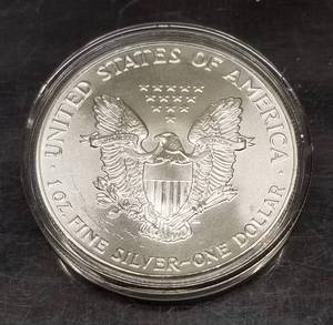 1986 SILVER EAGLE TRADE UNIT 1 TROY OZ .999 FINE SILVER IN AIRTITE