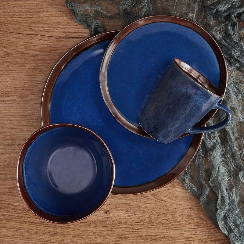 lot 42 image: Mikasa Talia 16 Piece Dinnerware Set, Service For 4, Blue