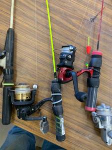 ice fishing lot, rods, reels, & dipper