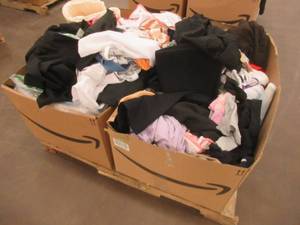lot 817 image: LEFT OVER ITEMS FROM THE AMAZON BIN SALE - You may find several treasures, including clothes, costumes, games, Small Housewares and more
