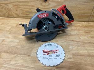 lot 1 image: MILWAUKEE M18 FUEL 18-Volt Lithium-Ion Cordless 7-14 in. Rear Handle Circular Saw with Blade (Tool-Only)
