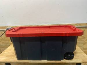 lot 117 image: HUSKY 45 Gal. Latch and Stack Tote in Red and Black with Wheels