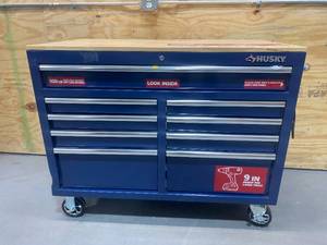 lot 7 image: HUSKY 46 in. W x 24.5 in. D 9-Drawer Gloss Blue Deep Tool Chest Mobile Workbench with Hardwood Top