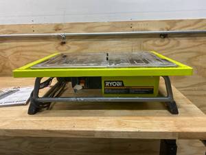 lot 46 image: RYOBI 7 in. 4.8 Amp Tabletop Tile Saw