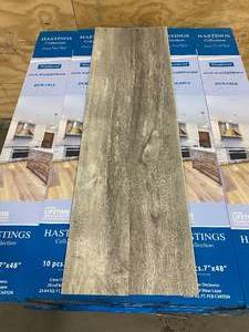 lot 19 image: HASTINGS COLLECTION Lot of 55 Boxes of- 100% Waterproof Luxury Vinyl Plank Flooring in Weathered (1,300 sq. ft.)
