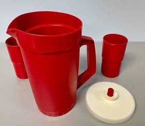 lot 15 image: Tupperware Red Pitcher with Matching Glasses. 