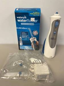 lot 76 image: Waterpick Cordless Water Flosser