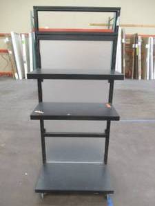 Rolling Retail Fixture With Frosted Backing and Shelving (27 x 28 x 63 Tall).