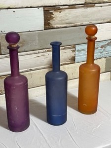 lot 79 image: Decorative Glass Bottles Pier One