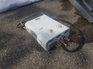 lot 557 image: Propane Tankless Water Heater