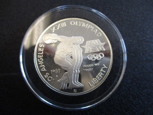 55. 1983-S US Olympic 1oz Silver Commemorative Dollar (Athlete ObverseEagle Reverse)