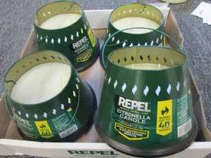 lot of 4 repel citronella candles ...