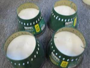 lot of 4 repel citronella candles ...